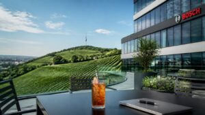 Stuttgart city view with corporate terrace and paper straw
