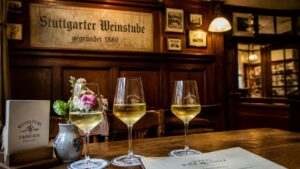 Traditional Swabian Weinstube interior in Stuttgart, Germany with regional wine glasses
